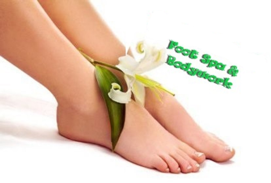 Picture of pretty feet with white Lily and sign 